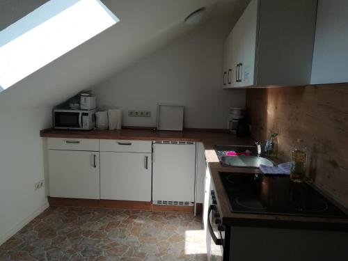 ห้องครัว, Ferienwohnung am Torbogen Nr.3 in เชอเนเฟลด์