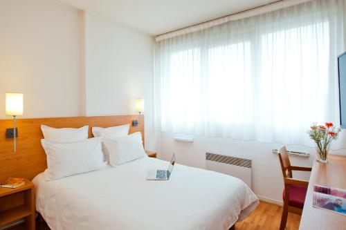 Sejours & Affaires Lyon Saint-Nicolas Séjours & Affaires Lyon Saint-Nicolas is perfectly located for both business and leisure guests in Lyon. The hotel offers a wide range of amenities and perks to ensure you have a great time. Free Wi-