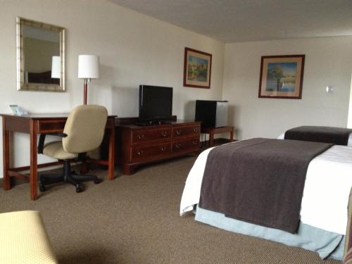 Holiday Hill Inn & Suites Set in a prime location of Dennis Port (MA), Holiday Hill Inn & Suites puts everything the city has to offer just outside your doorstep. The property features a wide range of facilities to make your s