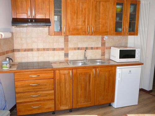 Konyha, Casa Screm - Appartamenti e Camere -Rigolato - UD in Piancavallo