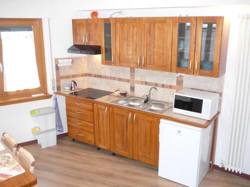 Konyha, Casa Screm - Appartamenti e Camere -Rigolato - UD in Piancavallo