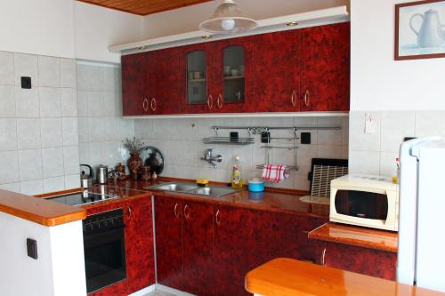 ห้องครัว, Ibolya Apartmanok in ฟอนยอด