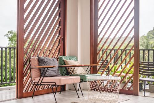 Shared lounge/TV area, The Dearly Koh Tao Hostel-PADI 5 Star Dive Resort in Chalok Baan Kao