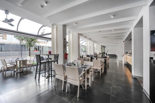 อาหารและเครื่องดื่ม, เบลลินี เรอแล (Bellini Relais) in ลิญญาโน ซับเบียโดโร