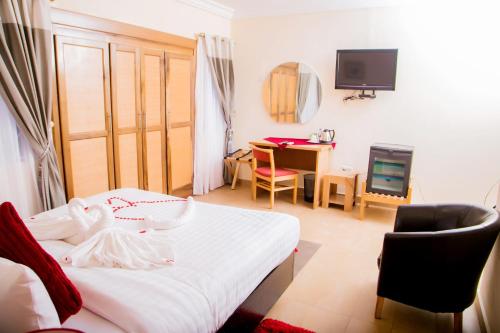 ห้องส่วนกลางสำหรับนั่งเล่น/ดูทีวี, Eden Vale Hotel in มาดินา