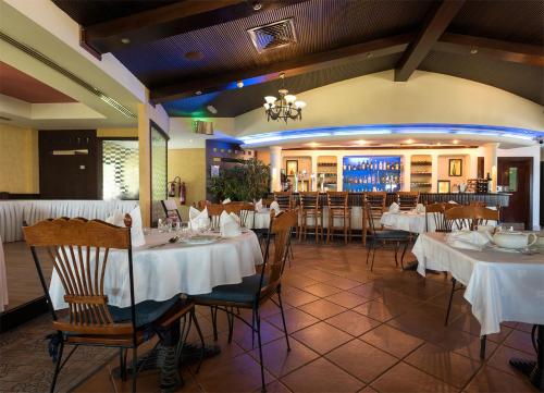 Bar/lounge, Barracuda Beach Resort near Falaj Al Mulla garden Park