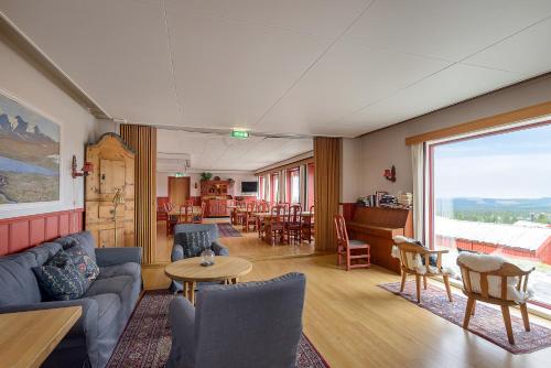 Aufenthaltsraum/TV-Zimmer, Lillehammer Fjellstue og Hytteutleie in Lillehammer