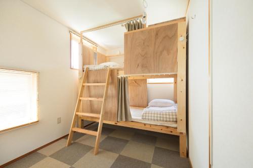 Female Twin Room with Bunk Bed and Shared Bathroom