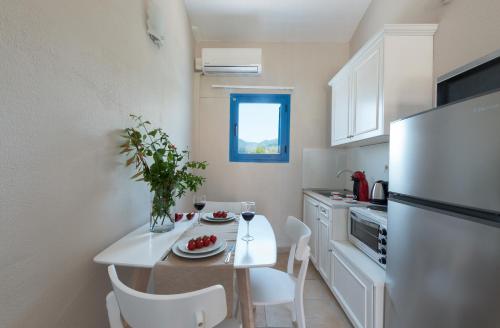 Ammoudia Maisonettes Ammoudia Maizonettes is perfectly located for both business and leisure guests in Corfu Island. Both business travelers and tourists can enjoy the propertys facilities and services. Service-minded st