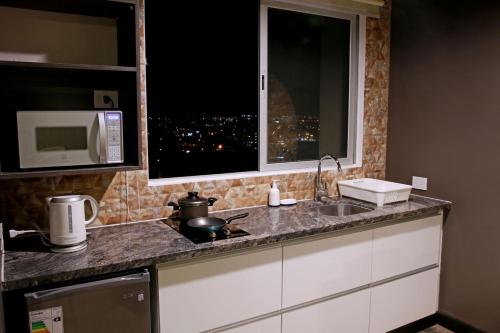Urban Suites Apart Hotel - 주방