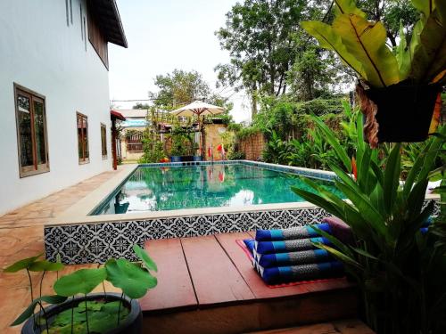 Swimming pool, Angkor Dino B&B in Angkor National Park