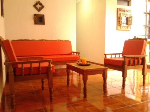 Shared lounge/TV area, Hotel Bethel in Coban