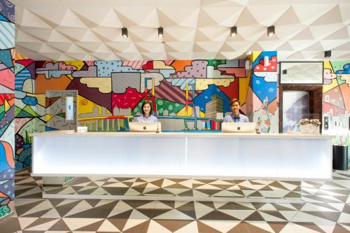 Lobby, MaxOneHotels.com@Dharmahusada - Surabaya near DEPOT CHRISTINE