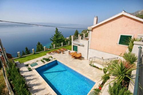 Family friendly house with a swimming pool Mimice Omis - 4644