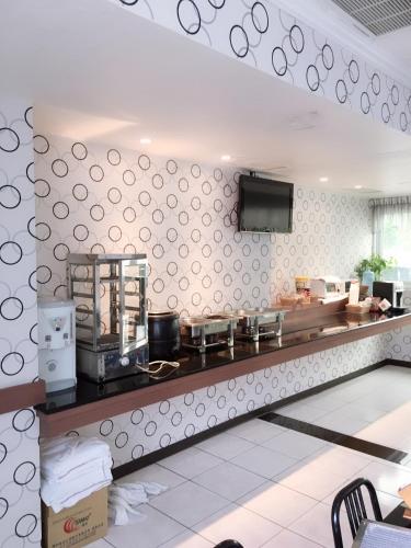 Restaurant, Treasure Island Motel - Renwu in Niaosong District