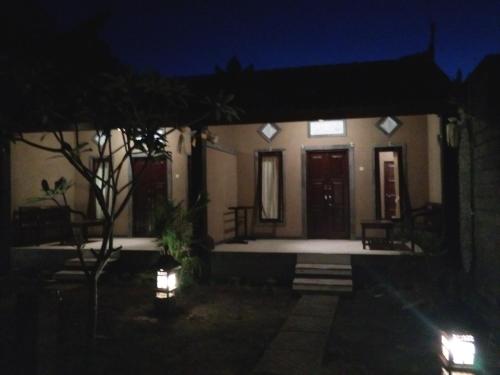 balkon/terras, Prisida Guest House in Pemuteran