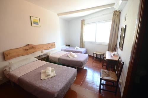 Hostal La Palmera Room Type - Triple Room
