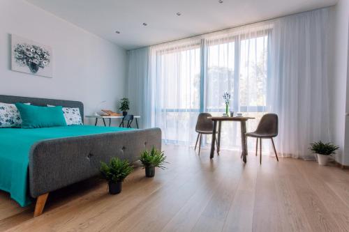 1-bedroom penthouse with underground parking, Ryga (zdjęcie 10)