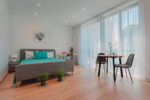 1-bedroom penthouse with underground parking, Ryga (zdjęcie 4)