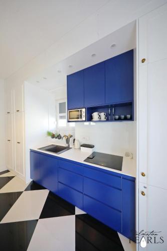 Three Pearls Deluxe Rooms & Studios 5