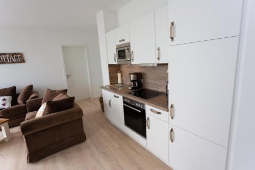 Kitchen, Komfort-Ferienwohnung Waterkant by Meer-Ferienwohnungen in Olpenitz