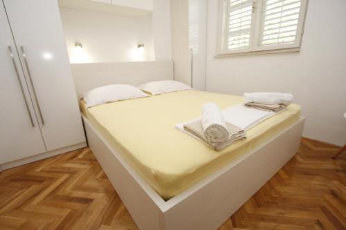 Three-Bedroom Apartment with Balcony room in Apartments by the sea Makarska - 15840