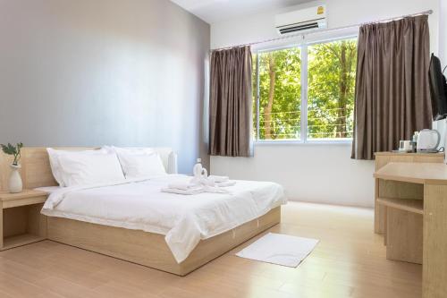 Gastenkamer, 32m² studio Appartement, met 1 privé badkamer in Lopburi stadscentrum (O2 Hotel Lopburi) in Lopburi