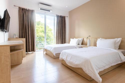 Gastenkamer, 32m² studio Appartement, met 1 privé badkamer in Lopburi stadscentrum (O2 Hotel Lopburi) in Lopburi