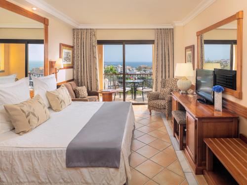 GF GRAN COSTA ADEJE***** The 5-star Costa Adeje Gran Hotel offers comfort and convenience whether youre on business or holiday in Tenerife. The hotel has everything you need for a comfortable stay. Free Wi-Fi in all rooms, 2