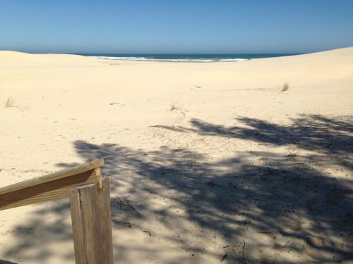 strand, Garopaba Praia Club in Camacho