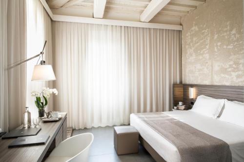 חדר שינה, Hotel & Resort Le Colombare in פוליגנו