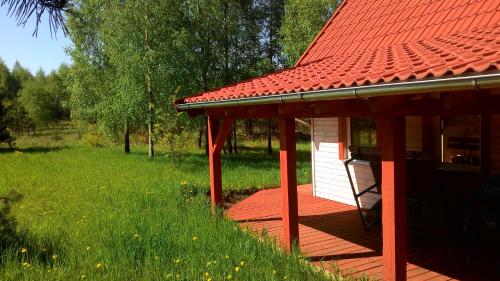 Dārzs, Domek Letniskowy przy lesie in Kruklanki