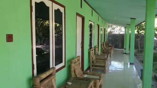 Exterior view, Ekas Beach Guesthouse Mitra RedDoorz in Tanjung Ringgit