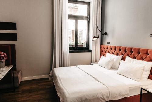 Abokamento Boutique Rooms - Tap to explore photos