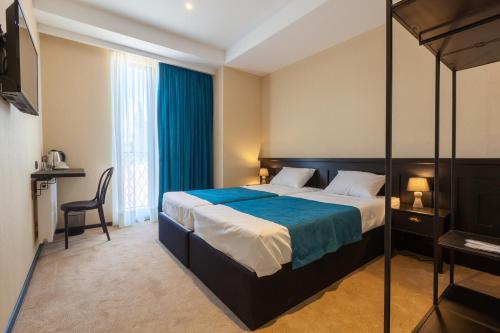 Solomon Room Type - Double or Twin Room with City View