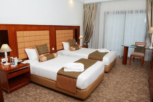 Marigold Hotel Marigold Hotel is a popular choice amongst travelers in Tunis, whether exploring or just passing through. The property features a wide range of facilities to make your stay a pleasant experience. To b