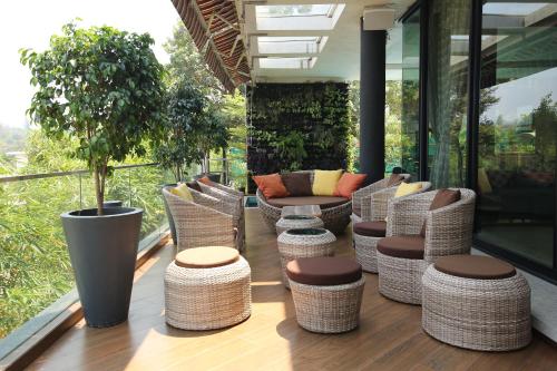 Balcony/terrace, Villa 41 by StayVista - A chic retreat with a pool, poker table, and a theater room in Lonavala