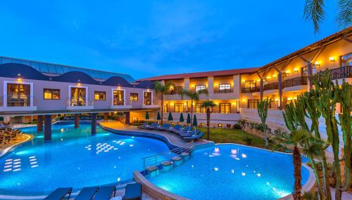 Swimming pool, Porto Platanias Beach Resort & Spa in Platanias