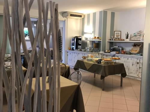 Ресторан, Hotel il Delfino in Сан - Вінченцо