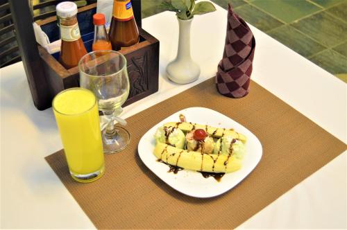 Comida y bebida, M Hotel in Dar Es Salaam