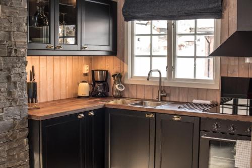 ห้องครัว, Vågåvatnet Feriesenter (Vagavatnet Feriesenter) in ดอมบัส