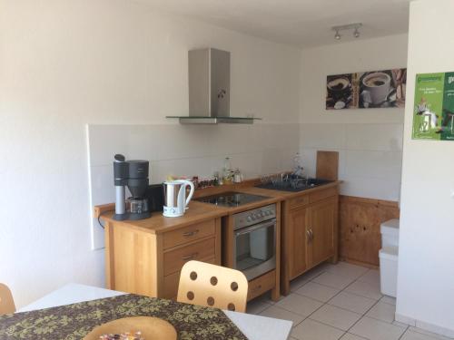 廚房, Ferienwohnung Globetrotter in 霍斯特馬爾