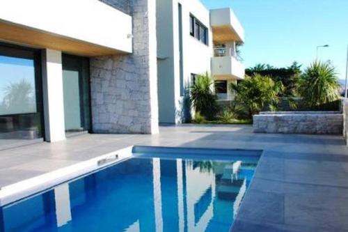 Villa d'exception, piscine, vue mer, plage à 100M gîte à louer Plage du Ricanto