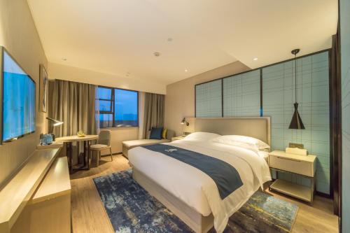 Photos of Echarm Hotel Guangzhou University Town Chimelong Banqiao Metro Station · Stays