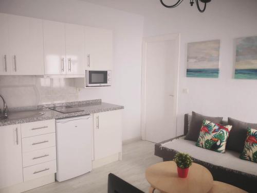 Apartamentos El Barrio - image 14