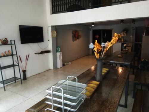 Shared lounge/TV area, The 25 Hostel in Hat Yai