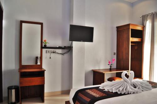 Pradana Beach Inn Luxury Pradana Beach Inn Luxury is perfectly located for both business and leisure guests in Bali. The property offers a high standard of service and amenities to suit the individual needs of all travelers. 