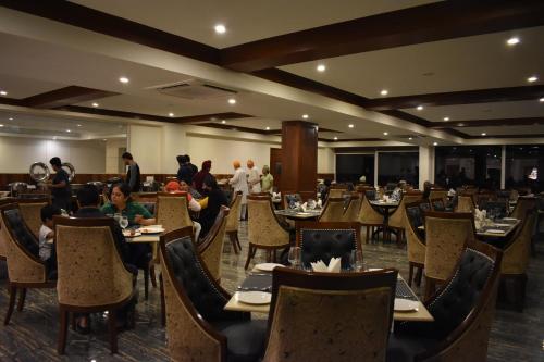 Restaurant, The Allure Grand Resort and Spa  in Manali