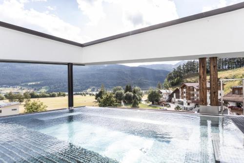 Aktiv- und Wellnesshotel Traube- Post, Pension in Graun im Vinschgau bei Melag