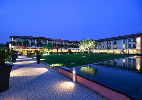 Kert, TH Lazise – Hotel Parchi Del Garda in Lazise